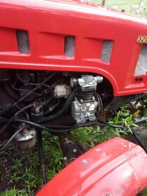 traktor BELORUS 320.4 , a PNEU - 4