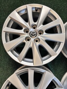 5x114,3 R17 Orig. alu disky Mazda - ET 50 - 4