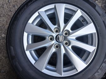Prodám sadu Orig ALU kol Mazda 225/65R17 letní - 4