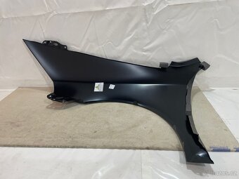 Pravý přední blatník Škoda Octavia II - 4