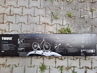 NOVÝ. NEVYBALENÝ. Nosič kol - Thule Proride 598. - 4