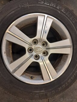 Subaru ALU Kola 6,5Jx16 ET48 Zimní 215/65/16 (Z263) - 4