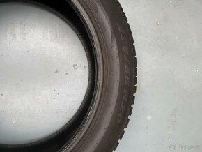 235/55R20 - 4