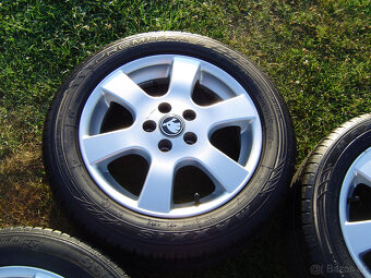 4XLETNÍ HLINÍKOVÁ KOLA ŠKODA FABIA III,IV ,RAPID 185/60 R15. - 4