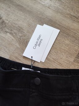 Calvin Klein pánské černé kalhoty - vel. XL - 4