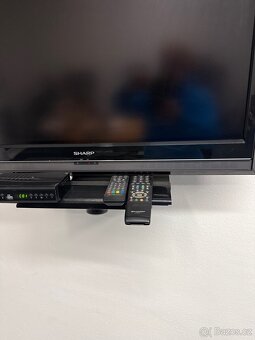 Televize,držák na tv,ovládání atd - 4