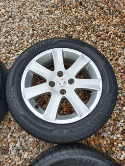 4x Alu Peugeot R16 + letní pneu 205/55 R16 91V - 4