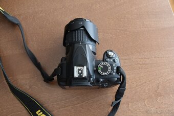 Nikon D3100 + Nikkor 18-55mm - 4