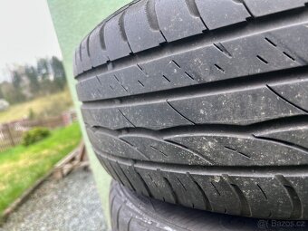 Prodám 4xletní pneu na plechových discích 195/65 R15 - 4