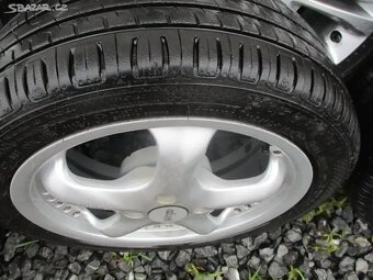 ALU kola PEUGEOT 6X16 ET22 s pneu 195/45/16 - 4