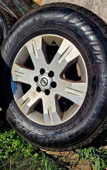Letní pneu Nokian 265/65/17 plus Alu kola originál Nissan - 4