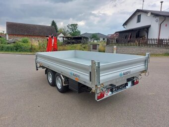 Třístranný sklápěč s rukou - 4