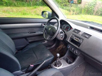 Suzuki Swift 1.4.i - 4
