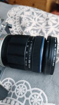 Olympus OM-D E-M1 s objektivem 14-150 a příslušenstvím - 4