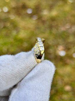 Zlatý prsten 3,69g
- 4