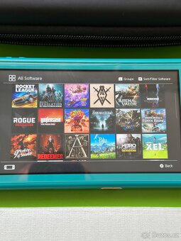 Nintendo Switch Lite 128GB + Spousta her + bonusy Aukce - 4