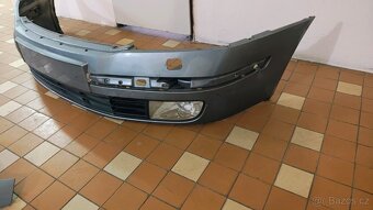 Škoda Octavia 2 -  přdní nárzník - 4
