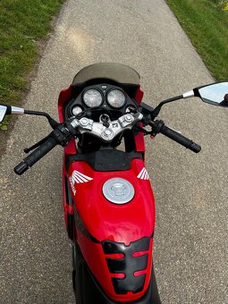 Honda cbr 125r - 4