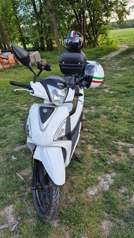 Skutr125 - 4