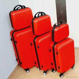 Cestovní skořepinové kufry - nové - 4