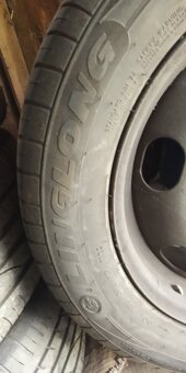 4 ks pneu 215/55 R16 97 W včetně disků 6,5 J x16 H2, ET26 - 4