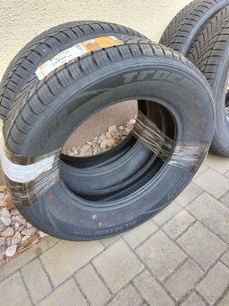 Prodám nové PNEU 4x celoroční 215/65 R16 98V - 4