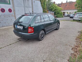 Škoda fabia combi 1.4i - 4