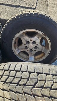 Jeep Cherokee. Prodam komplet zimni kola 225/70/15 - 4