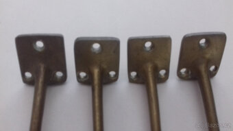 Mosazné dorazy -zarážky na okna.Cena zy 4ks. - 4