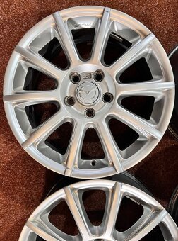 5x114,3 Mazda CX originál alu disky - ET 50 - 4