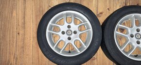 ALU 14" 4x100 ET38 s celoročními pneu 185/60/14 - 4