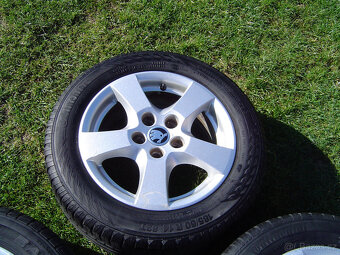 4XLETNÍ HLINÍKOVÁ KOLA ŠKODA FABIA II,III 185/60 R14 - 4