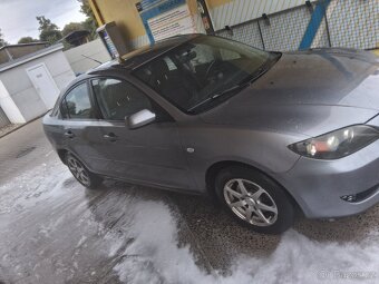 Mazda 3 sedan - 4
