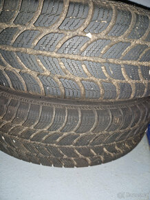 Plechové disky a zimní pneu 4x114,3 R14 komplet za 500 - 4