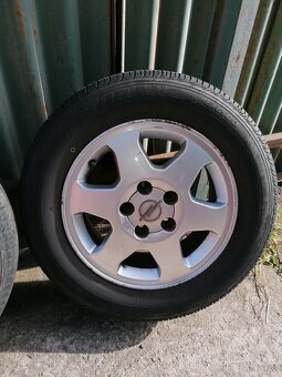 Alu disky Opel 5x110 6Jx15 ET49 + 195/65 R15 91H letní - 4