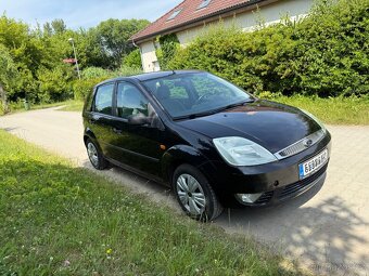 Ford Fiesta 1.4i 59kW GHIA - 4