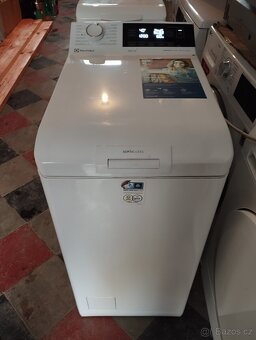 Vrchem plněná pračka Electrolux - 4