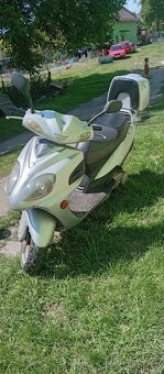 Yuki 125 - 4