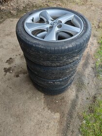Prodám sadu Alu disků MAZDA 7Jx17H2 ET55 + pneu 215/45/17 - 4