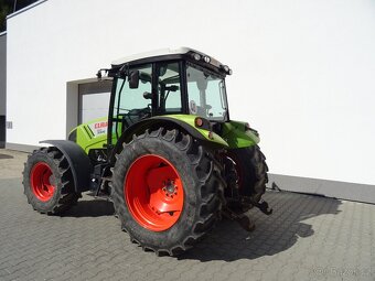Traktor CLAAS AXOS 310. - 4