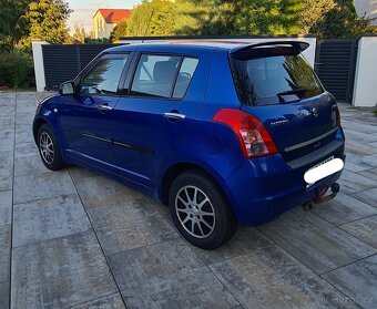 Suzuki Swift 1.3i 68 kW - 4