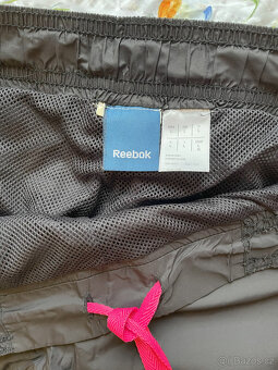 Prodám dámské sportovní šusťákové kalhoty Reebok - 4