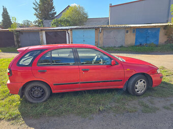 Nissan Almera 1.4 16V Spring hatchback garazovany - 4