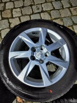 Prodám orig alu 15 Seat Ibiza 5x100 ET 38 zimní pneu - 4
