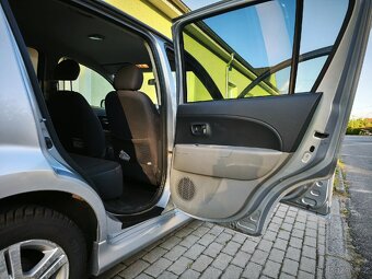 Daihatsu sirion 1,3i 64 kw - 4