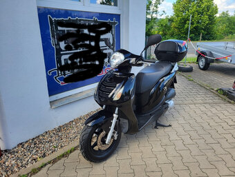 Honda PES 125i - 4
