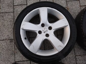 ALU kola Peugeot 17" vč. celoročních pneu a šroubů - 4