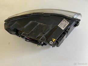 Audi A6 4F - Levý Bi- xenon Hella / 4F0941003 - 4