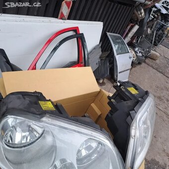 Predni světla vw Caddy / touran Na jednom je jeden držák ok - 4