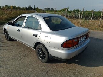 Mazda 323 - 4
